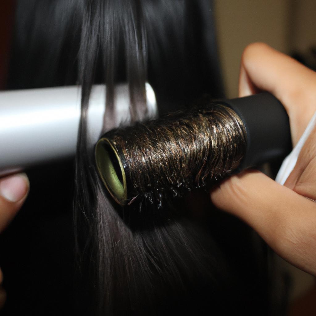Person using hair styling tools